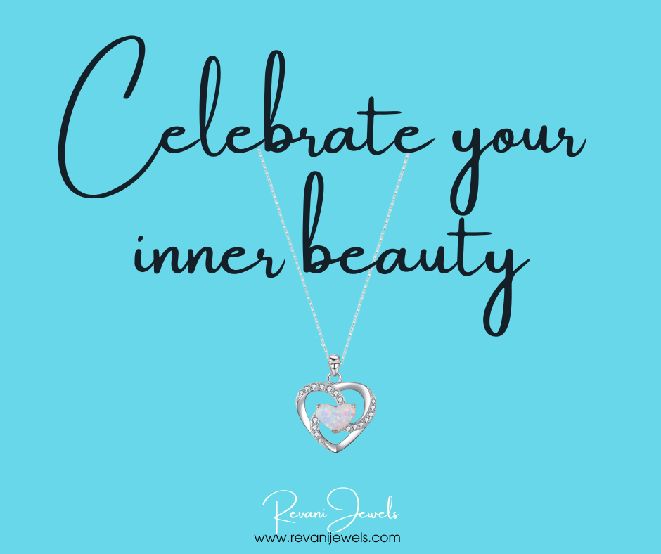 Silver open-heart pendant necklace with cubic zirconia and an opal center, symbolizing inner beauty and the light within.