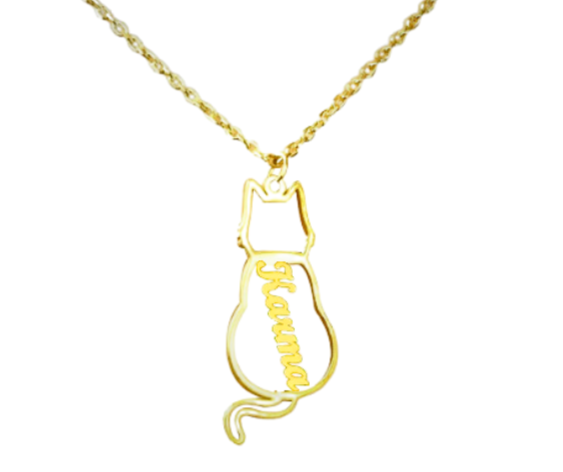 Gold cat-shaped pendant necklace with "Karma" engraved vertically, symbolizing positivity, balance, and feline grace.