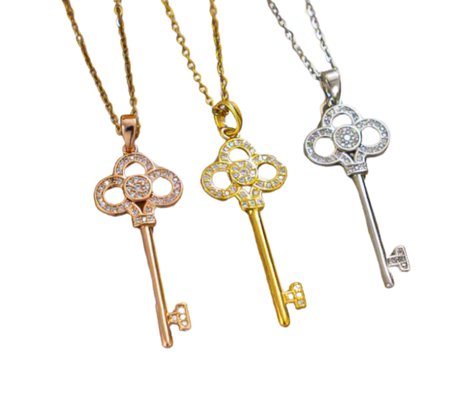 Elegant skeleton key pendant with cubic zirconia accents, symbolizing self-expression and the power to unlock lifeās beauty.