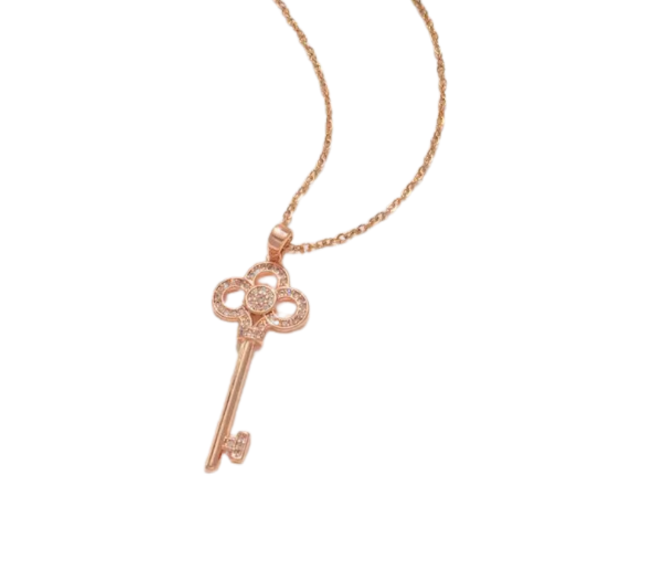 Elegant skeleton key pendant with cubic zirconia accents, symbolizing self-expression and the power to unlock lifeās beauty.