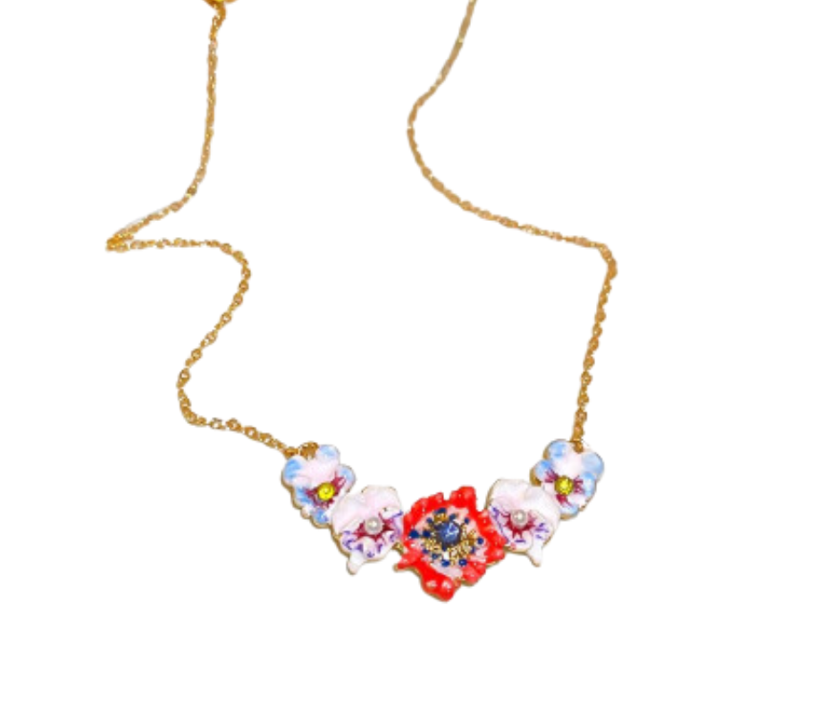 Floral jewelry set with vibrant hues, faux pearls, and CZ accents. Gold-plated vintage charm inspired by poppies and lyrical prose.