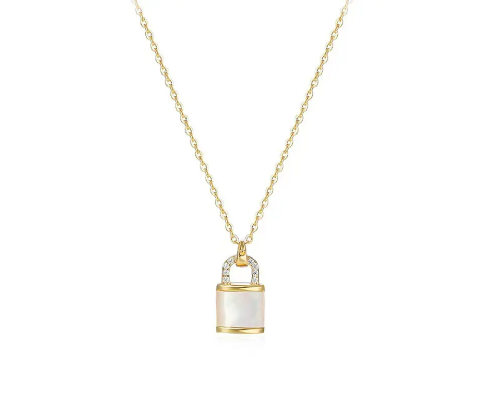 Gold-plated locket necklace with a pearl-like pendant and cubic zirconia accents, symbolizing love, connection, and cherished memories.
