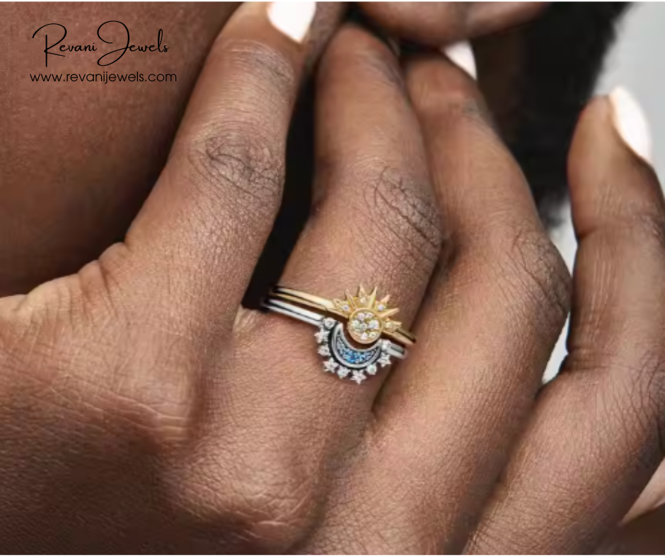 Close-up of a hand wearing a decorative ring with Revani Jewels branding.