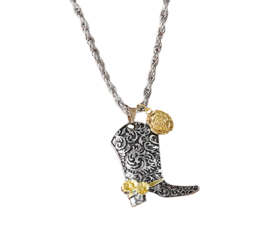 Silver-and-black cowboy boot pendant with gold wildflowers on an 18-inch chain, blending vintage charm with free-spirited style.