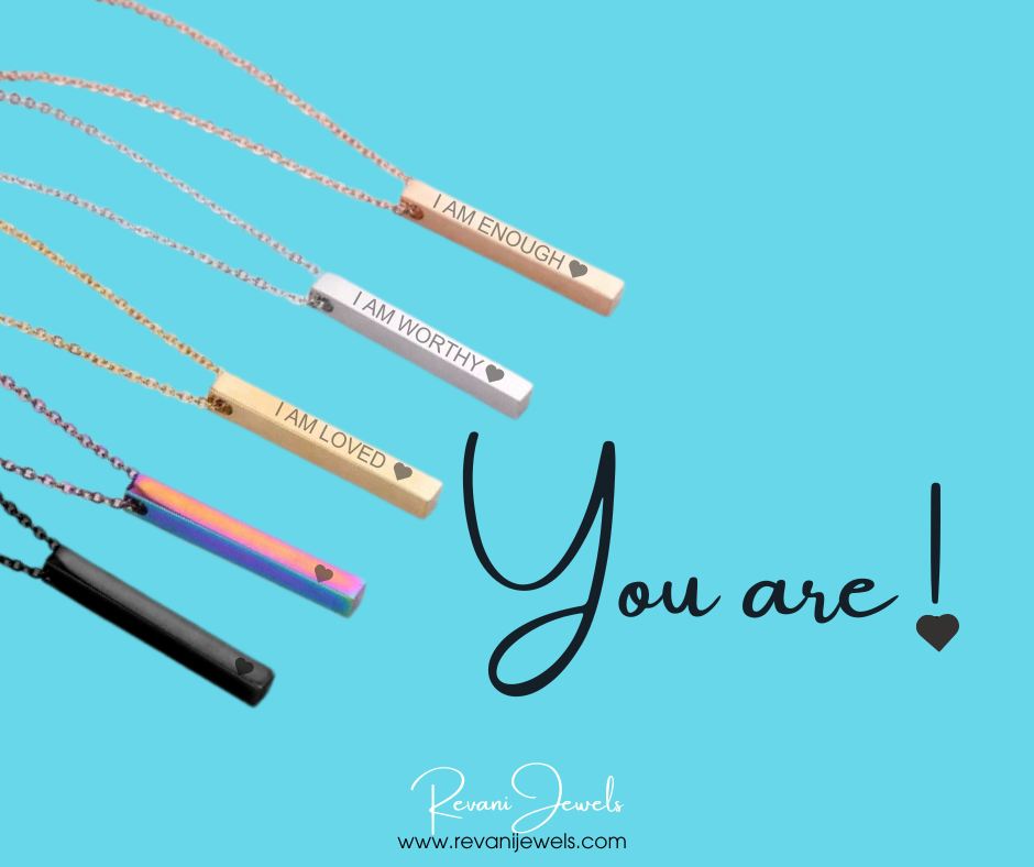 Sleek bar pendant necklace engraved with affirmations and a heart, symbolizing strength, value, and self-love. 5 colors available: Gold, Silver, Rose Gold, Iridescent, Black.