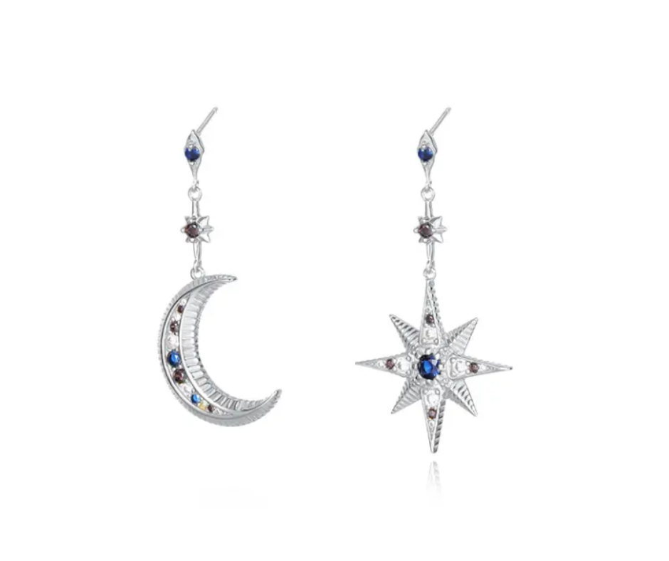 Celestial earrings featuring a crescent moon and an 8-pointed star, adorned with cubic zirconia, offering cosmic elegance in silver or gold.