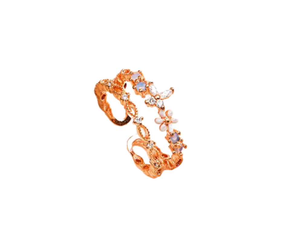 Gold-plated adjustable ring with pastel gemstones, featuring a butterfly and flower motif. A delicate reminder to bloom and fly fearlessly.