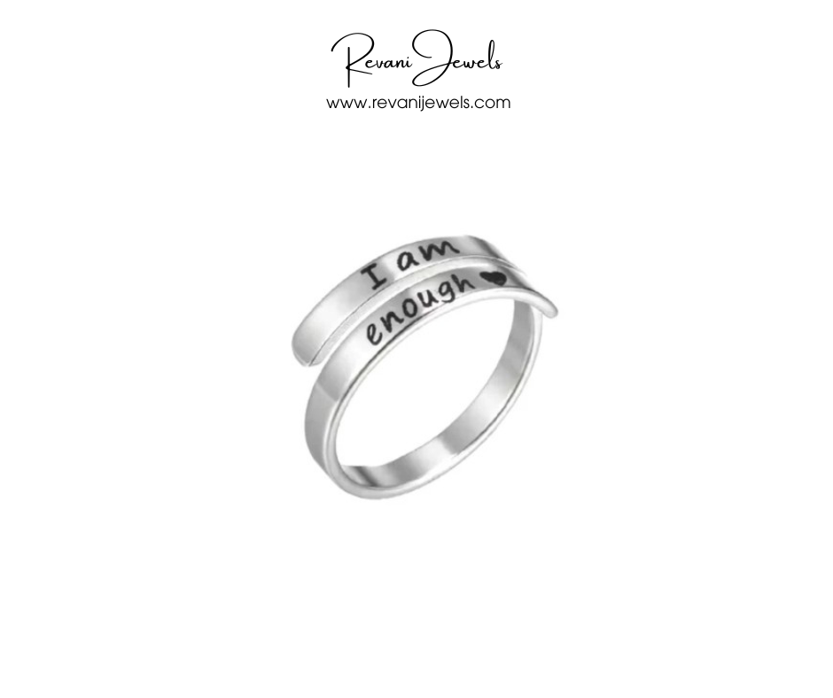 Silver ring with 'I am enough' engraving on a white background, branded as Revani Jewels.