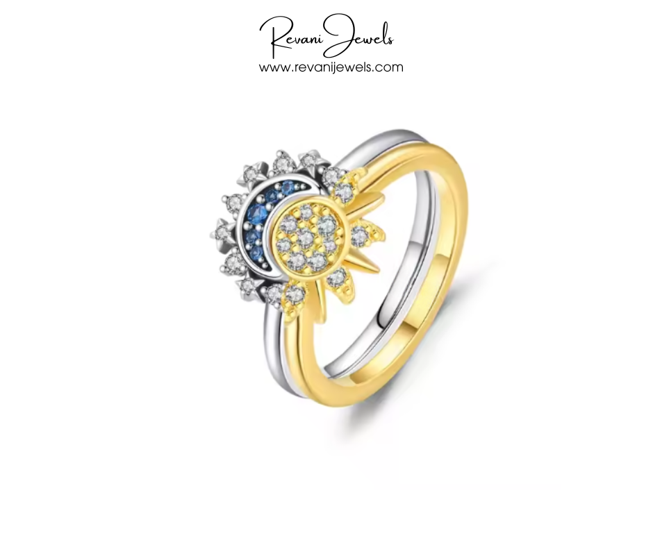 Gold and silver ring with gemstones on a white background, branded 'Revani Jewels'.