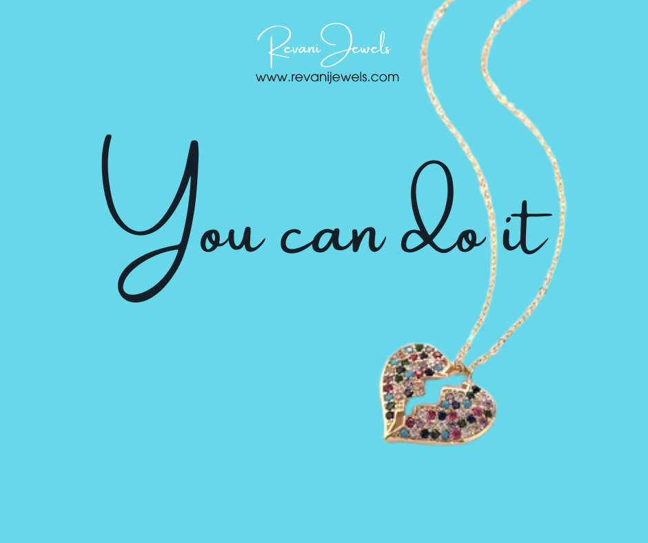 Heart-shaped necklace with colorful stones on a blue background with 'You can do it' text and Revani Jewels branding.