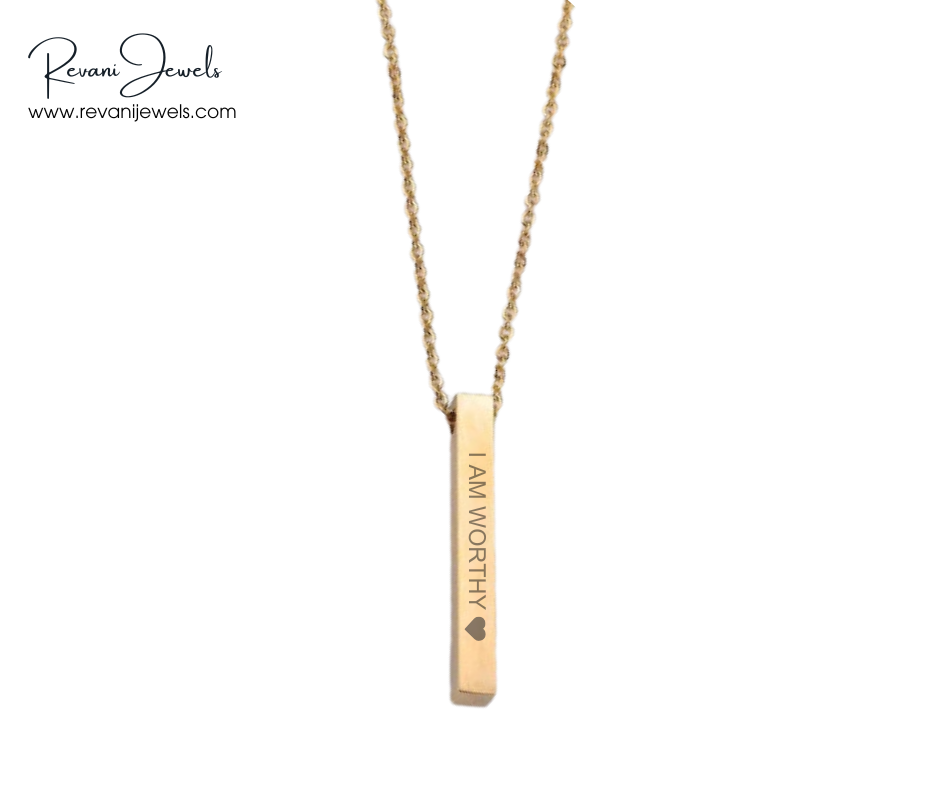 Gold necklace with 'I AM WORTHY' pendant on a white background, branded 'Revani Jewels'.