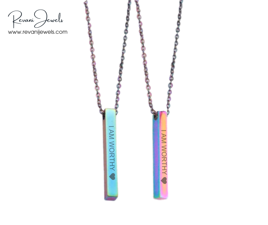 Two necklaces with 'I AM WORTHY' pendants on a white background, branded as Revani Jewels.