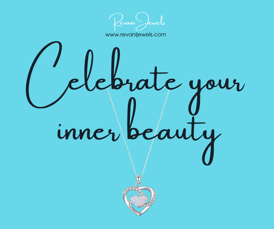 Heart-shaped pendant necklace with 'Celebrate your inner beauty' text on a blue background, featuring Revan Jewels branding.