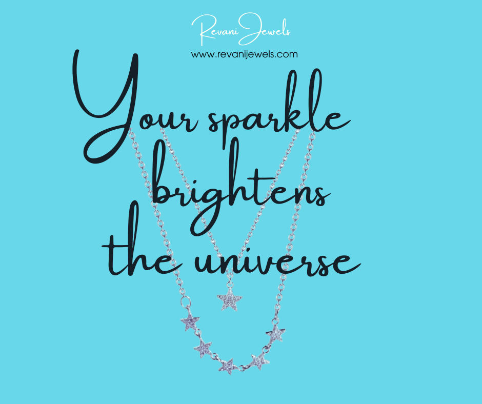 Necklace with star details on a blue background with text 'Your sparkle brightens the universe' and 'Revani Jewels' branding.