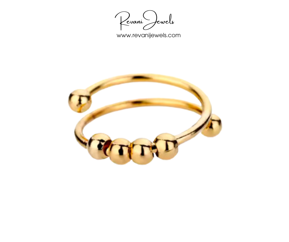 Gold open ring with spherical beads on a white background, branded as Revani Jewels.