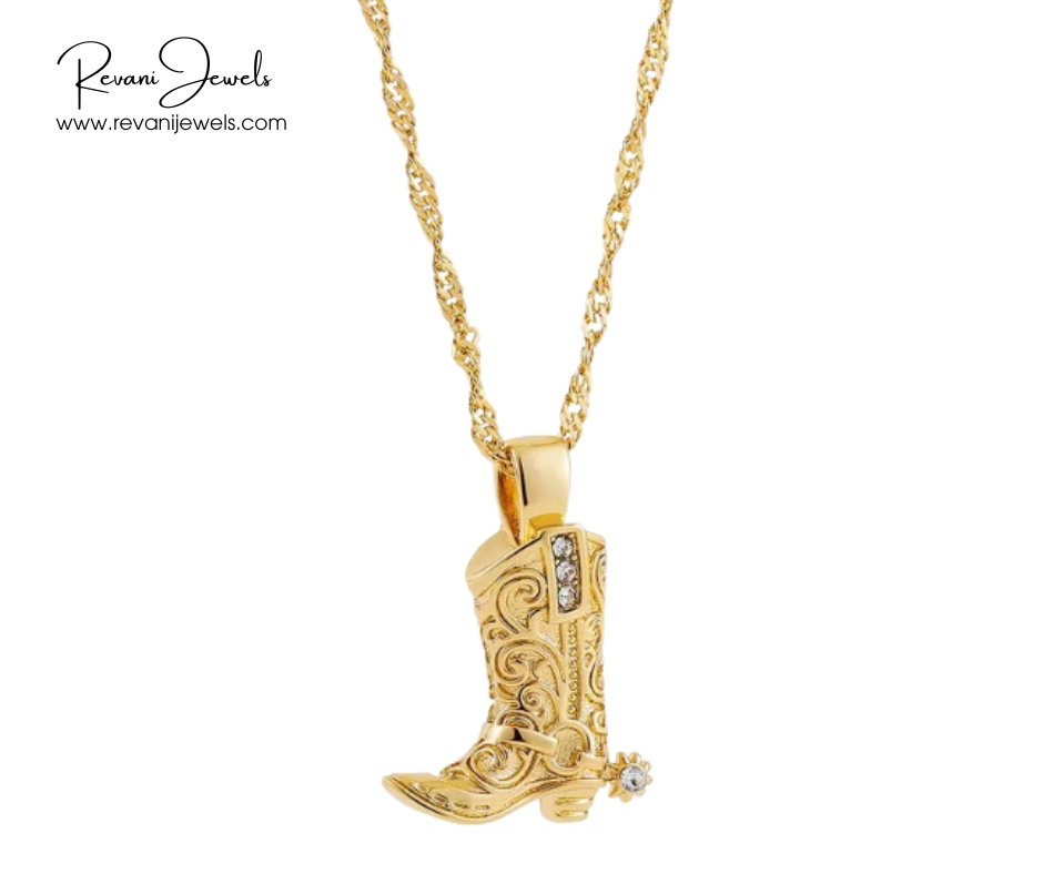 Gold cowboy boot pendant necklace with Revani Jewels branding on a white background