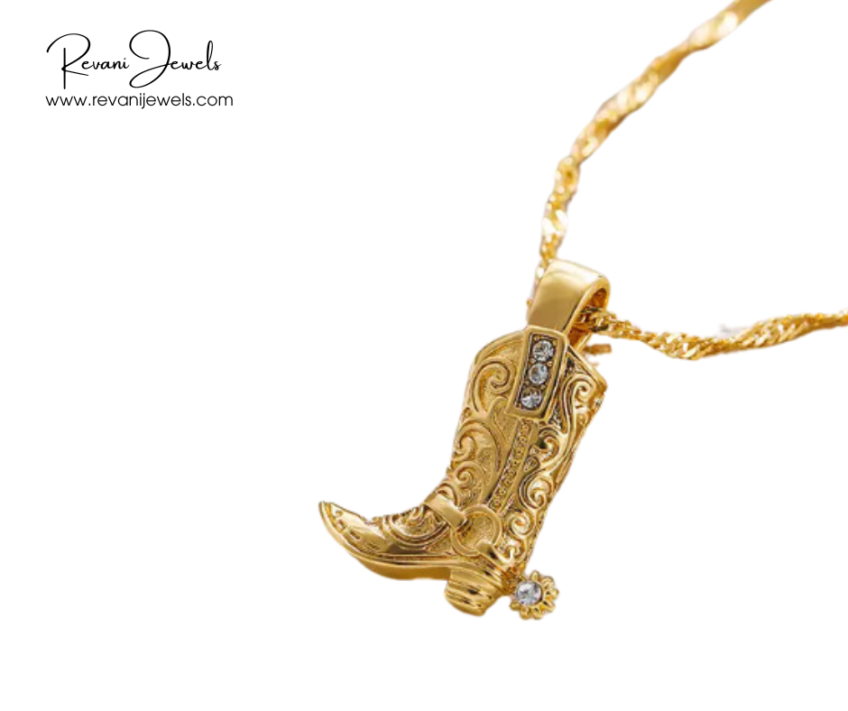Gold cowboy boot pendant necklace with 'Revani Jewels' branding on a white background