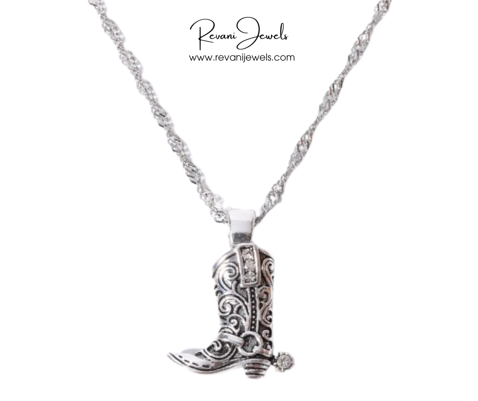 Silver boot-shaped pendant necklace on a white background with 'Revani Jewels' branding.