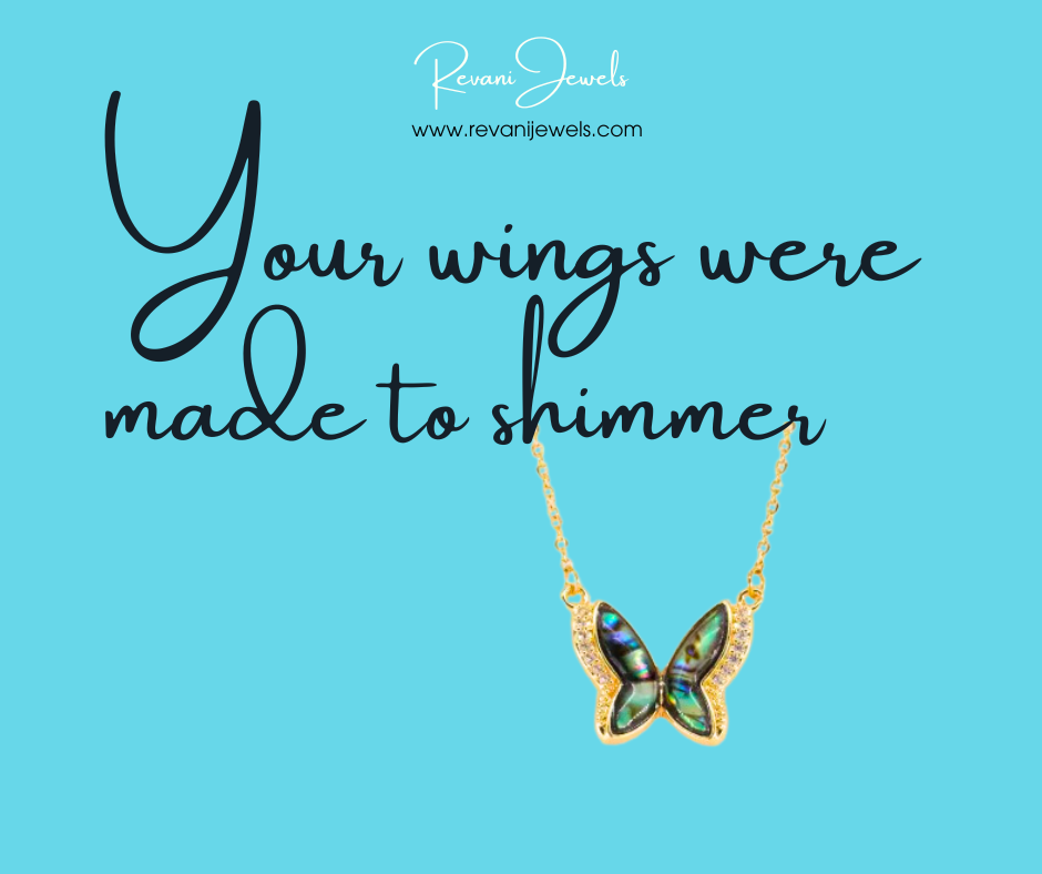 Butterfly necklace with gold chain on a blue background and motivational quote.
