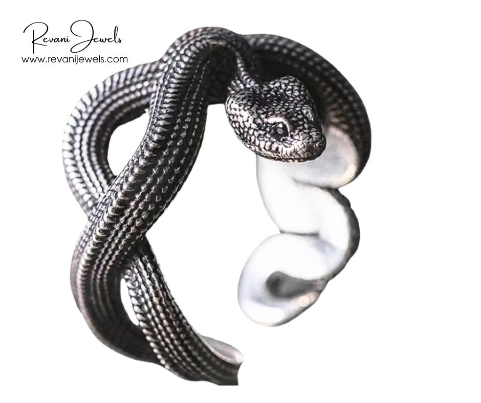 Silver snake-shaped ring on a white background with Revani Jewels branding.
