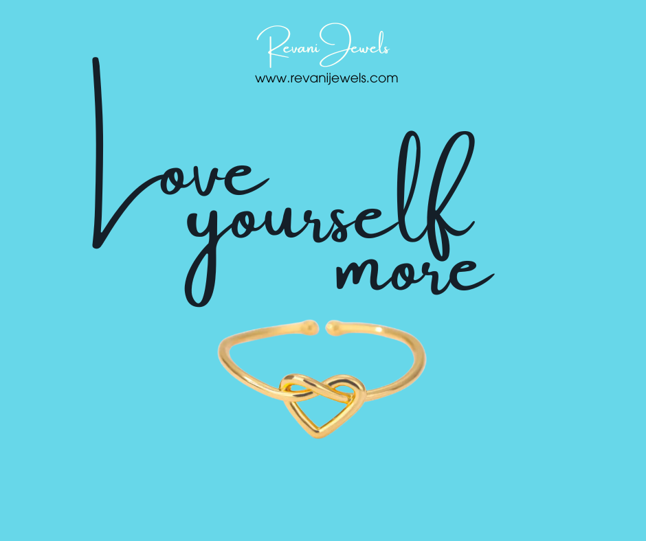 Gold ring with heart design on a blue background with 'Love yourself more' text and Revani Jewels branding.