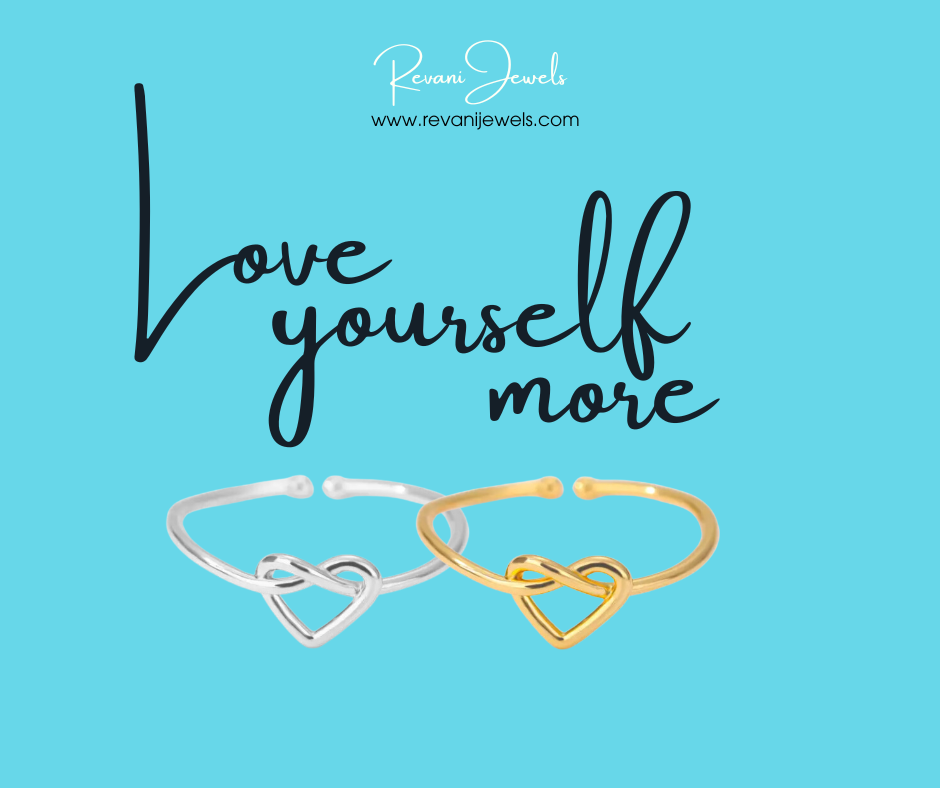 Two open heart-shaped rings, one silver and one gold, on a blue background with 'Love yourself more' text and Revani Jewels branding.